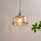 Retro Amber Glass Drum Pendant Light with Brass Accent - 1-Light