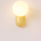 Macaron-Inspired Cream Resin Glass Ball 1-Light Wall Sconce