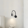 Lumio - Flexible black LED wall lamp for indoors