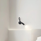 Lumio - Flexible black LED wall lamp for indoors