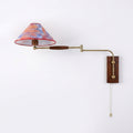 Arlo Swing-Arm Wall Sconce with Walnut Backplate
