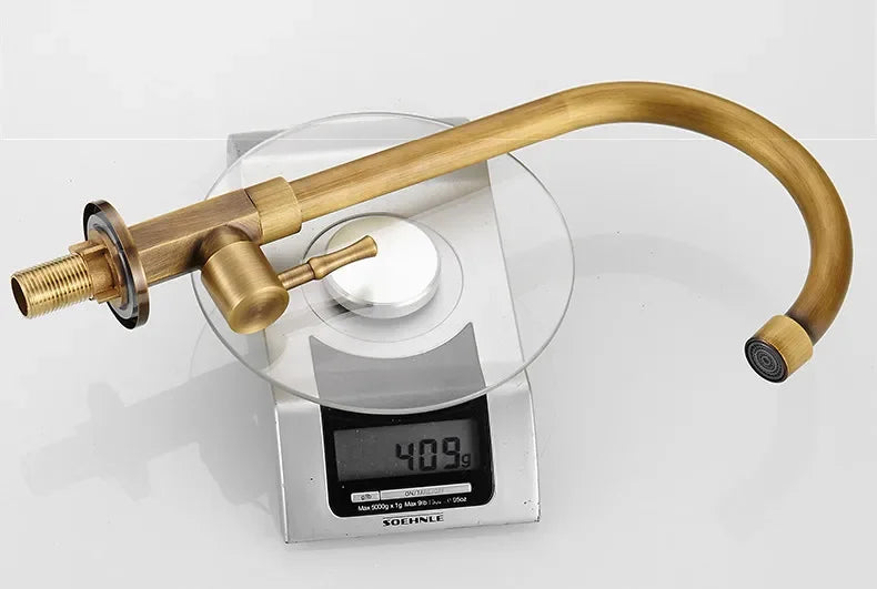 BronzeWelle: Retro Kitchen Faucet with Swan Neck – Antique Brass Design