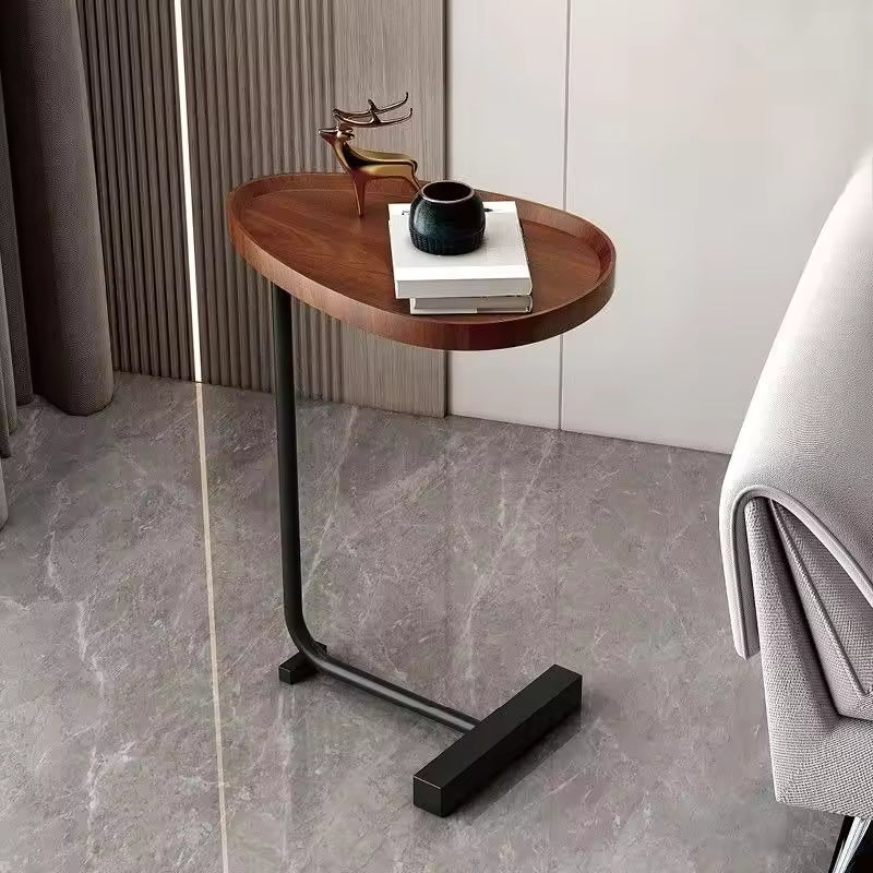 CaviraSchlau: C-shaped side table with compact size & flexible use – for sofa & bed