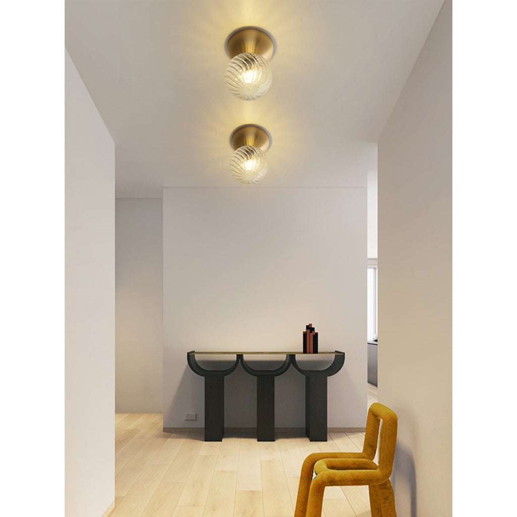Celeste Optical Swirl Glass Wall Sconce