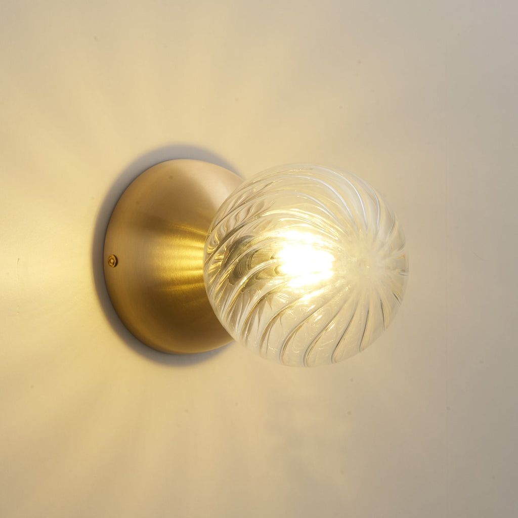 Celeste Optical Swirl Glass Wall Sconce