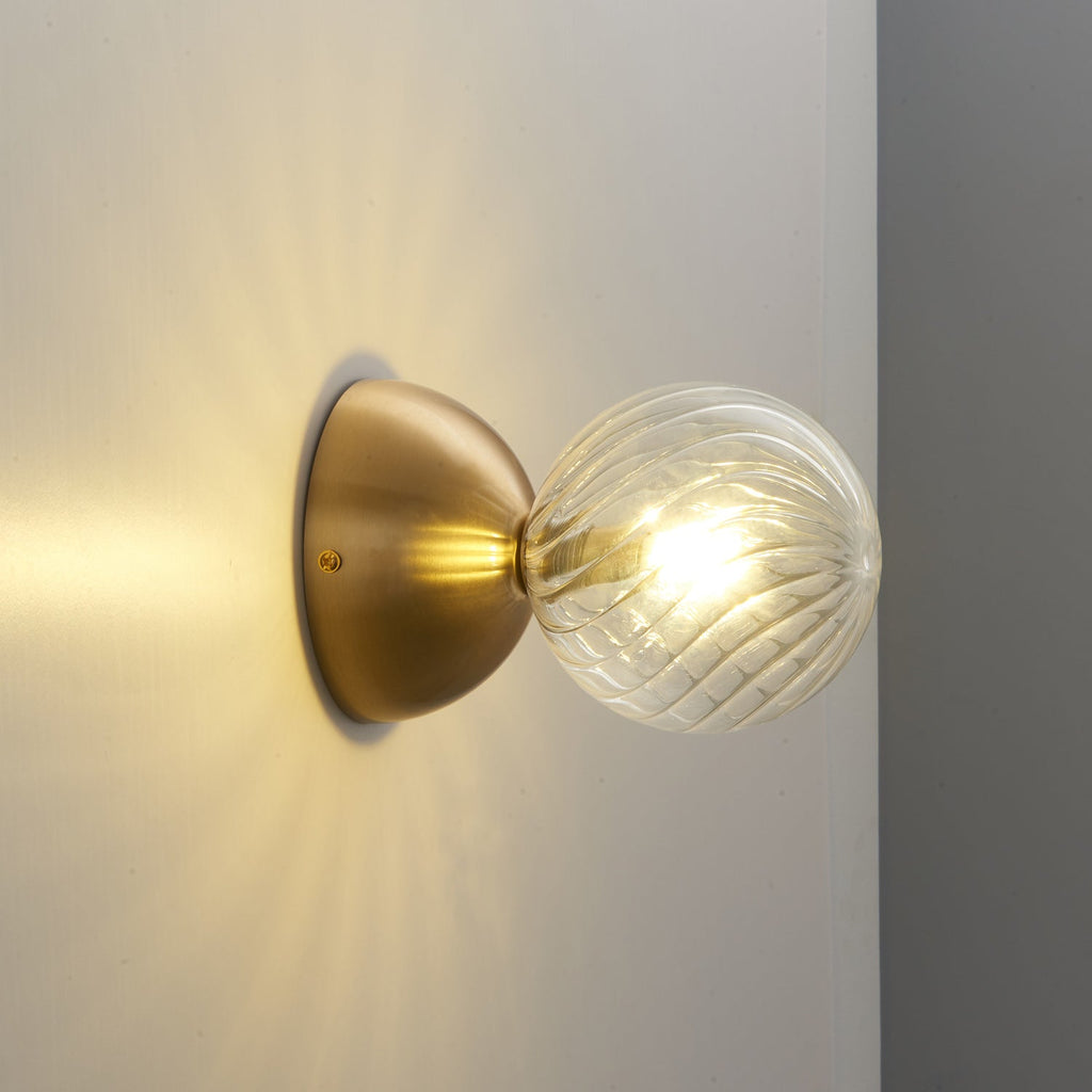 Celeste Optical Swirl Glass Wall Sconce