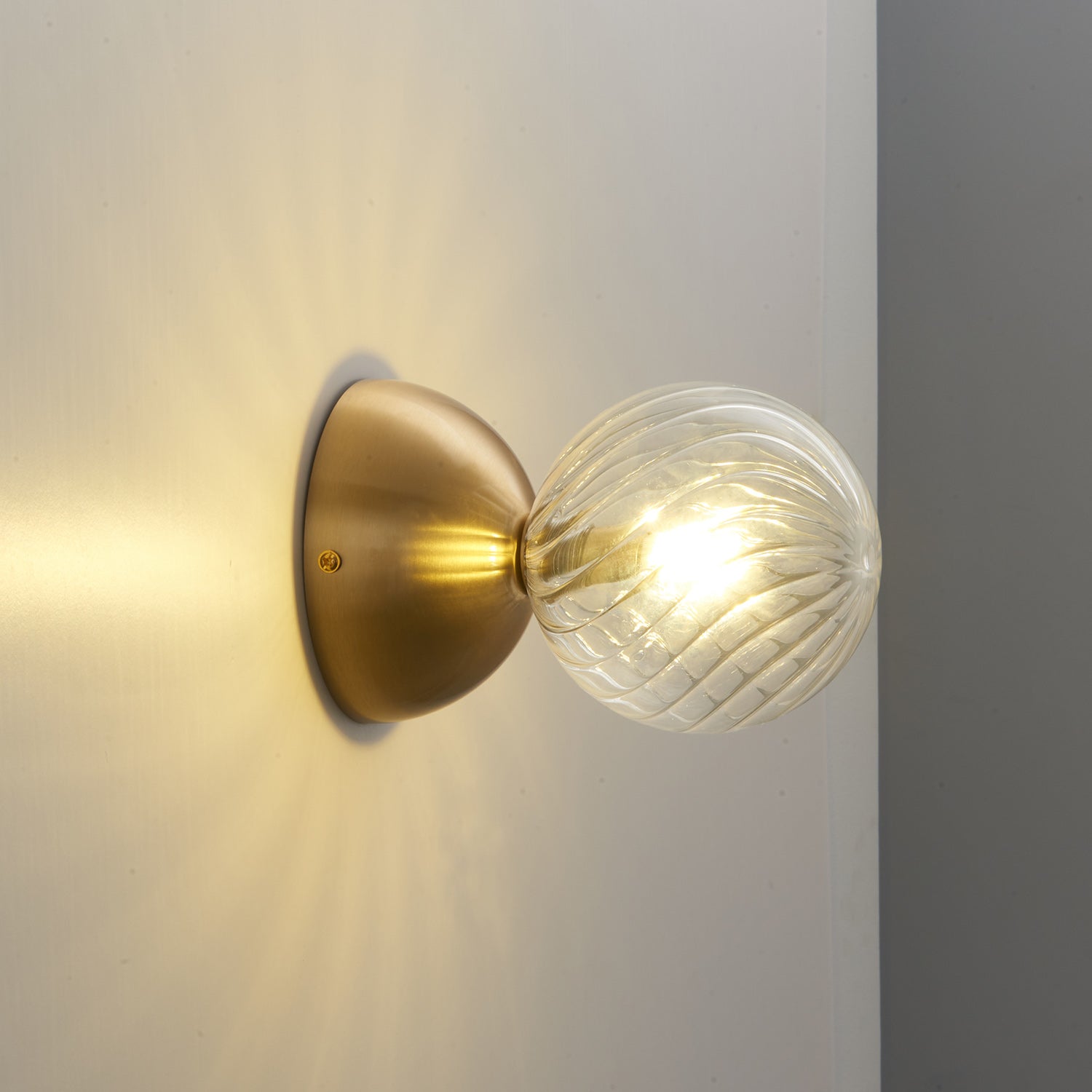 Celeste Optical Swirl Glass Wall Sconce
