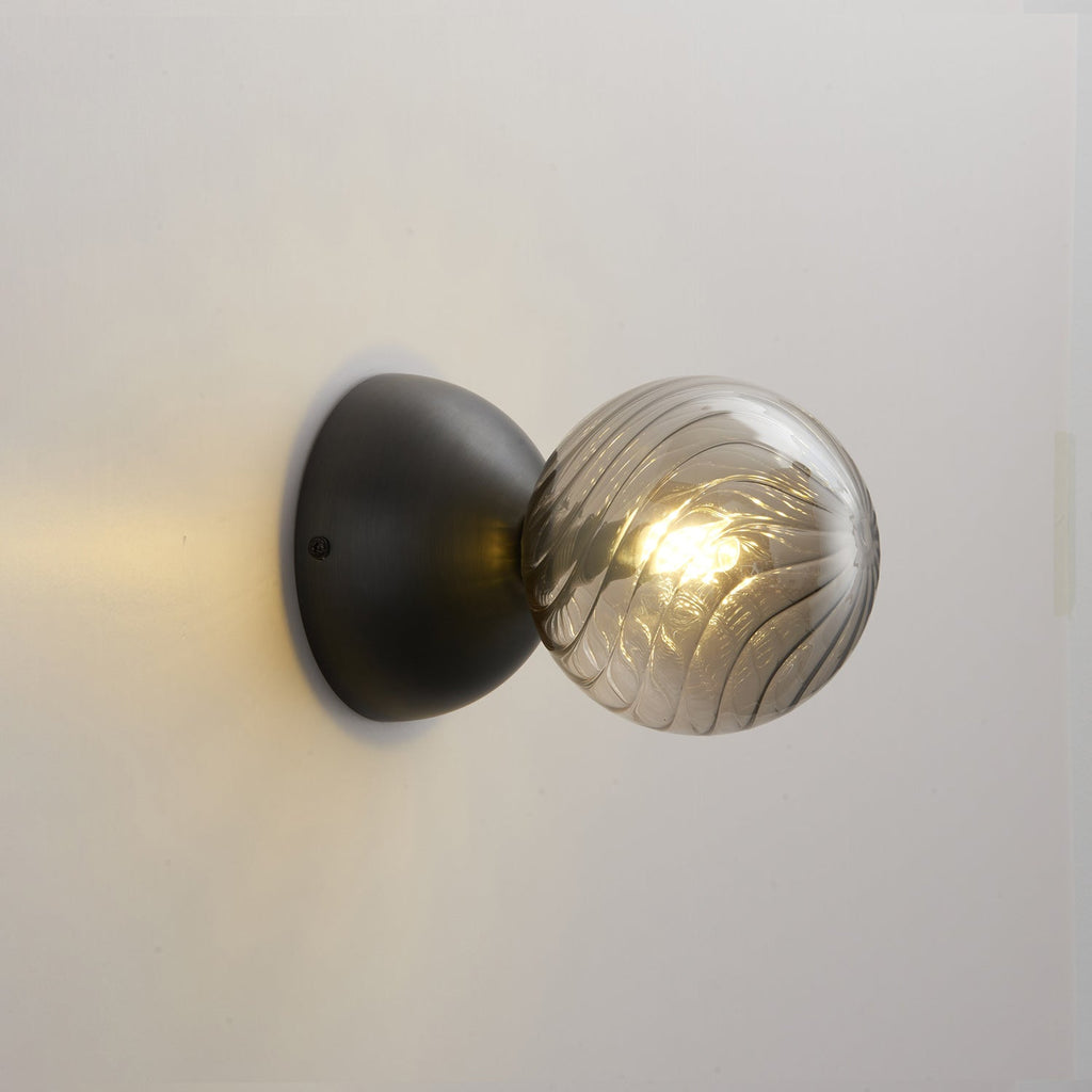 Celeste Optical Swirl Glass Wall Sconce