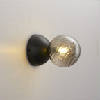 Celeste Optical Swirl Glass Wall Sconce