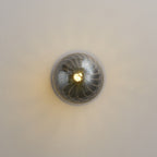 Celeste Optical Swirl Glass Wall Sconce