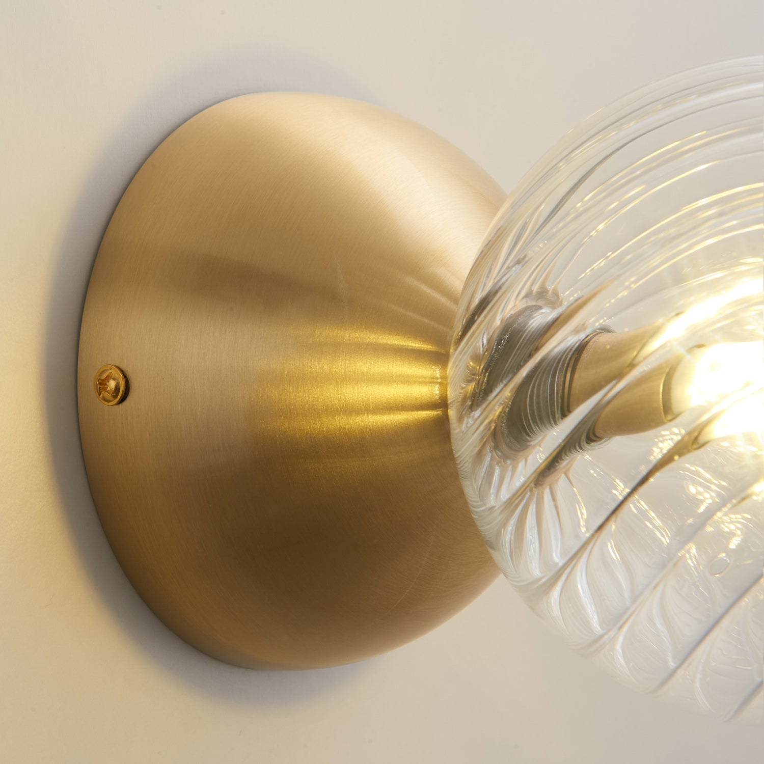 Celeste Optical Swirl Glass Wall Sconce