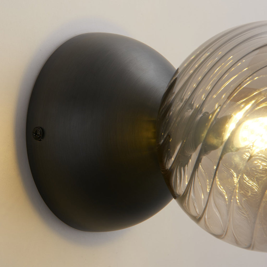 Celeste Optical Swirl Glass Wall Sconce