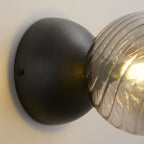 Celeste Optical Swirl Glass Wall Sconce