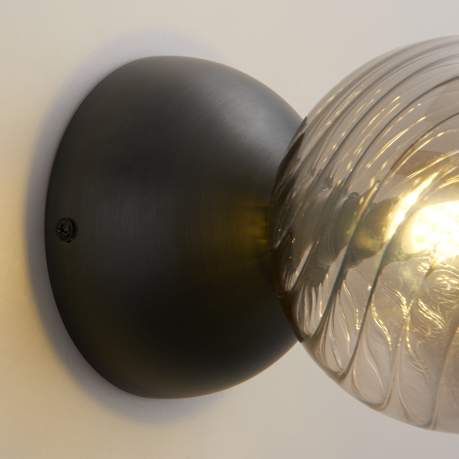 Celeste Optical Swirl Glass Wall Sconce