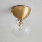 Celeste Optical Swirl Glass Wall Sconce