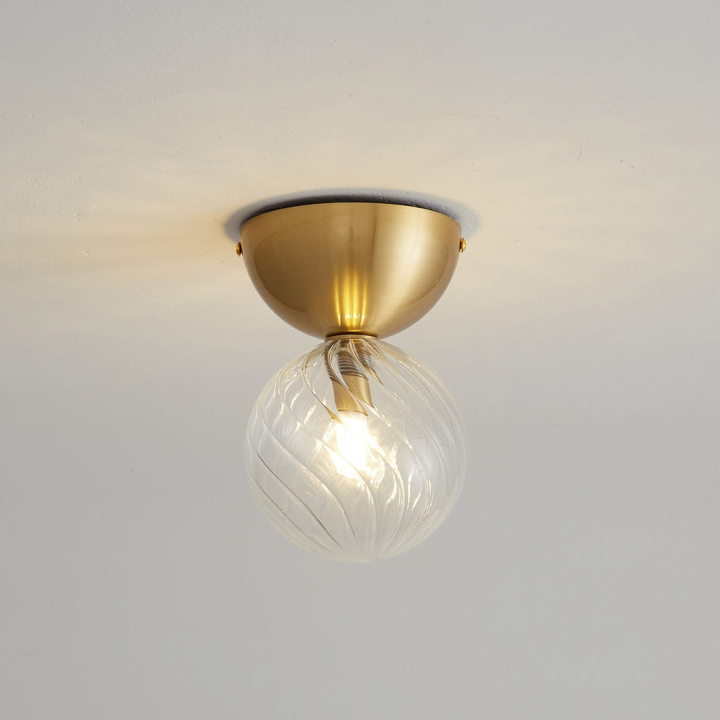 Celeste Optical Swirl Glass Wall Sconce
