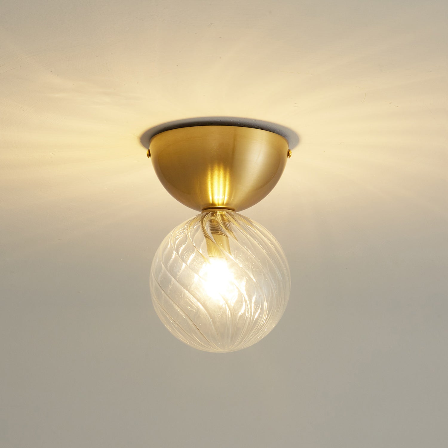 Celeste Optical Swirl Glass Wall Sconce