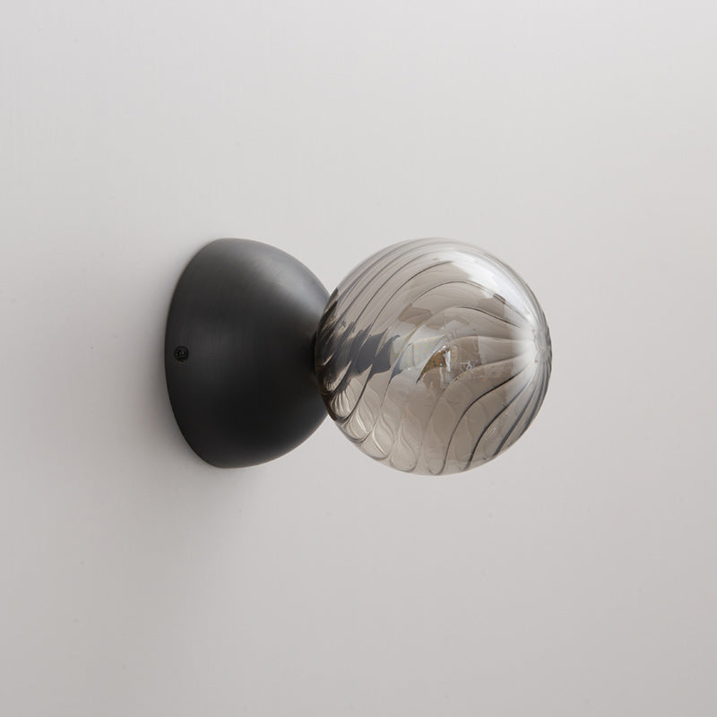 Celeste Optical Swirl Glass Wall Sconce