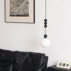 Frosted Globe Pendant with Stacked Wood Spheres