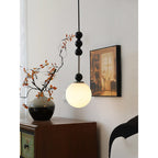 Frosted Globe Pendant with Stacked Wood Spheres