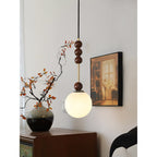 Frosted Globe Pendant with Stacked Wood Spheres