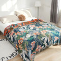 FloraSoleil: Cotton blankets in tropical flower pattern with jacquard weaving & reversible structure – for sofa & bedroom