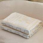 GeoSanft: Cotton blankets made from organic cotton with a modern geometric pattern & breathable structure – for sofa & bedroom