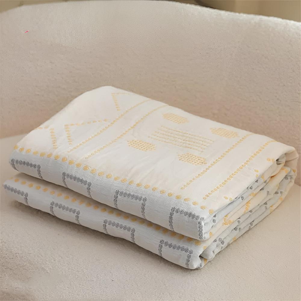GeoSanft: Cotton blankets made from organic cotton with a modern geometric pattern & breathable structure – for sofa & bedroom