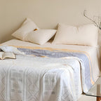 GeoSanft: Cotton blankets made from organic cotton with a modern geometric pattern & breathable structure – for sofa & bedroom