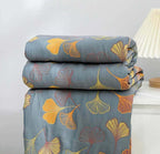 GinkLoom: Cotton blankets with floral Ginkgo design and easy-care surface – for sleeping and living areas