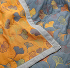 GinkLoom: Cotton blankets with floral Ginkgo design and easy-care surface – for sleeping and living areas