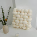 Myrrina - Decorative ornamental cushion with knot design