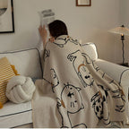 CuddleMeow: Cotton blankets made of cotton with a soft feel & playful cat design – for bed & living room