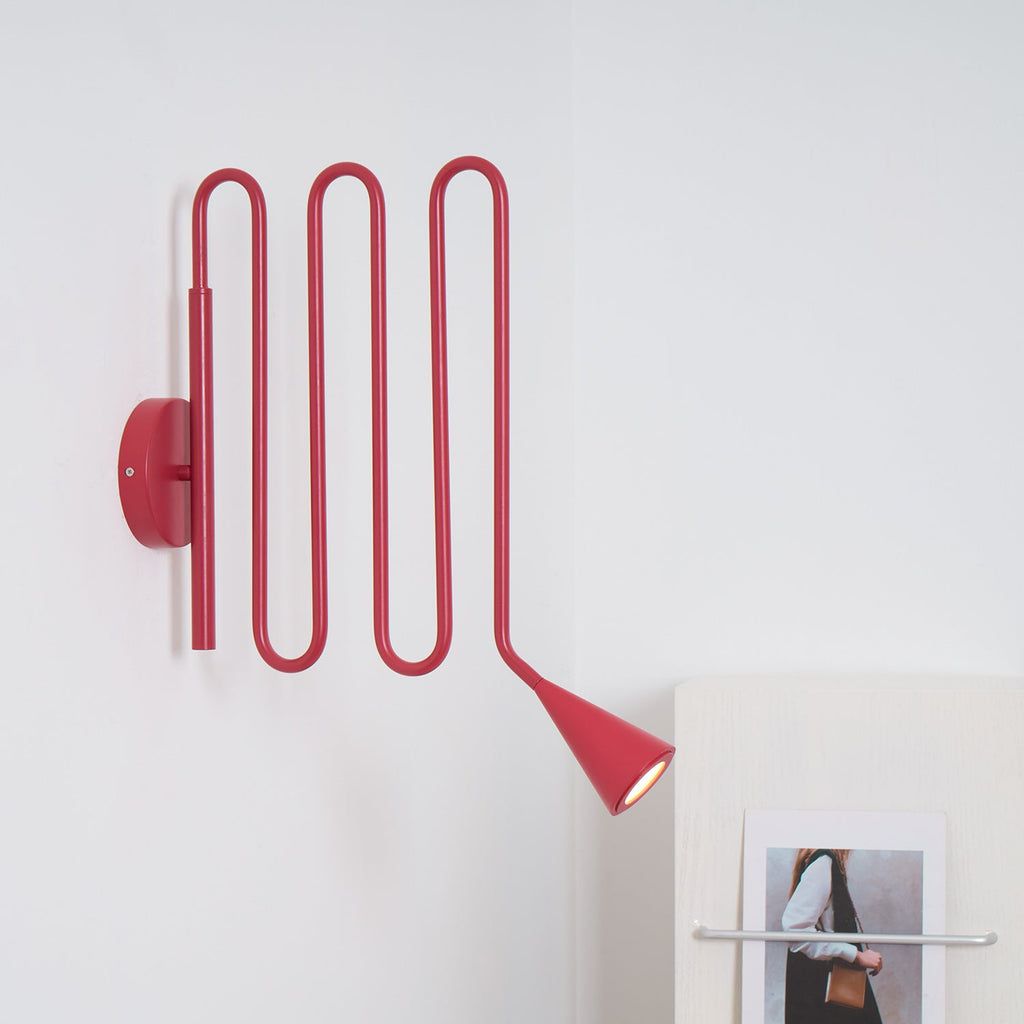 Curved Instrument-Inspired Metal Wall Lamp