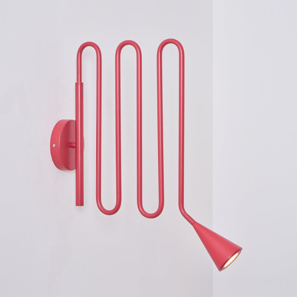 Curved Instrument-Inspired Metal Wall Lamp