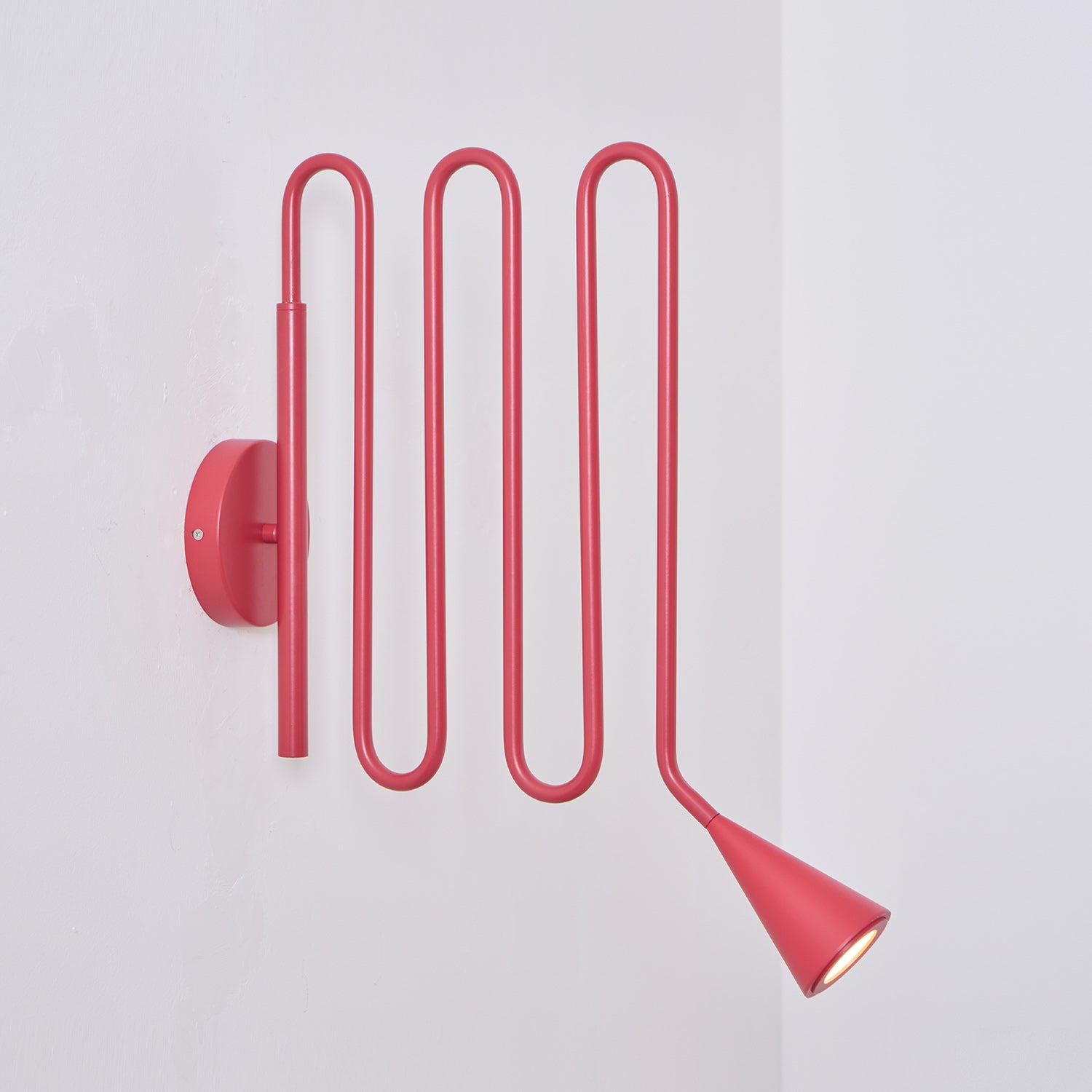 Curved Instrument-Inspired Metal Wall Lamp
