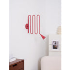 Curved Instrument-Inspired Metal Wall Lamp