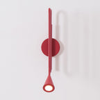 Curved Instrument-Inspired Metal Wall Lamp
