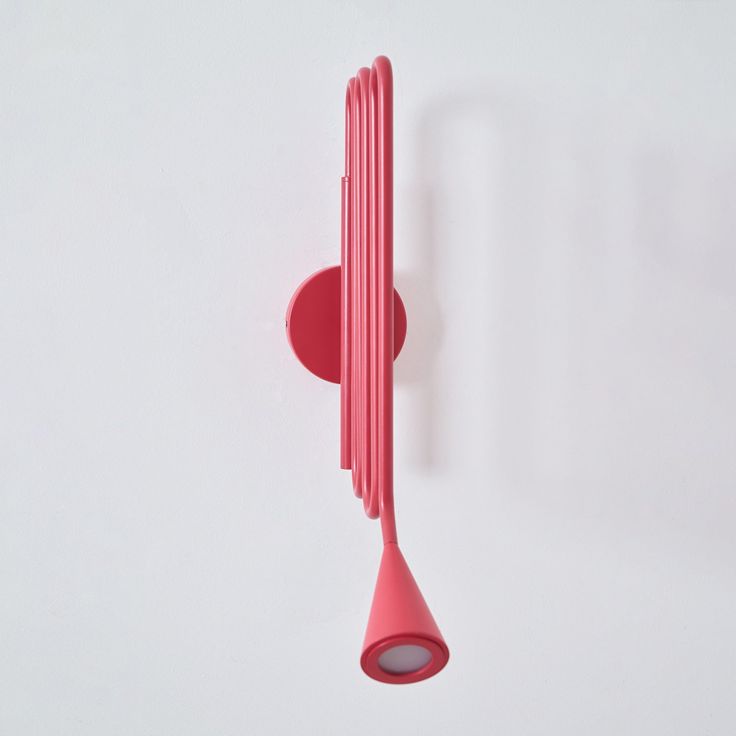 Curved Instrument-Inspired Metal Wall Lamp