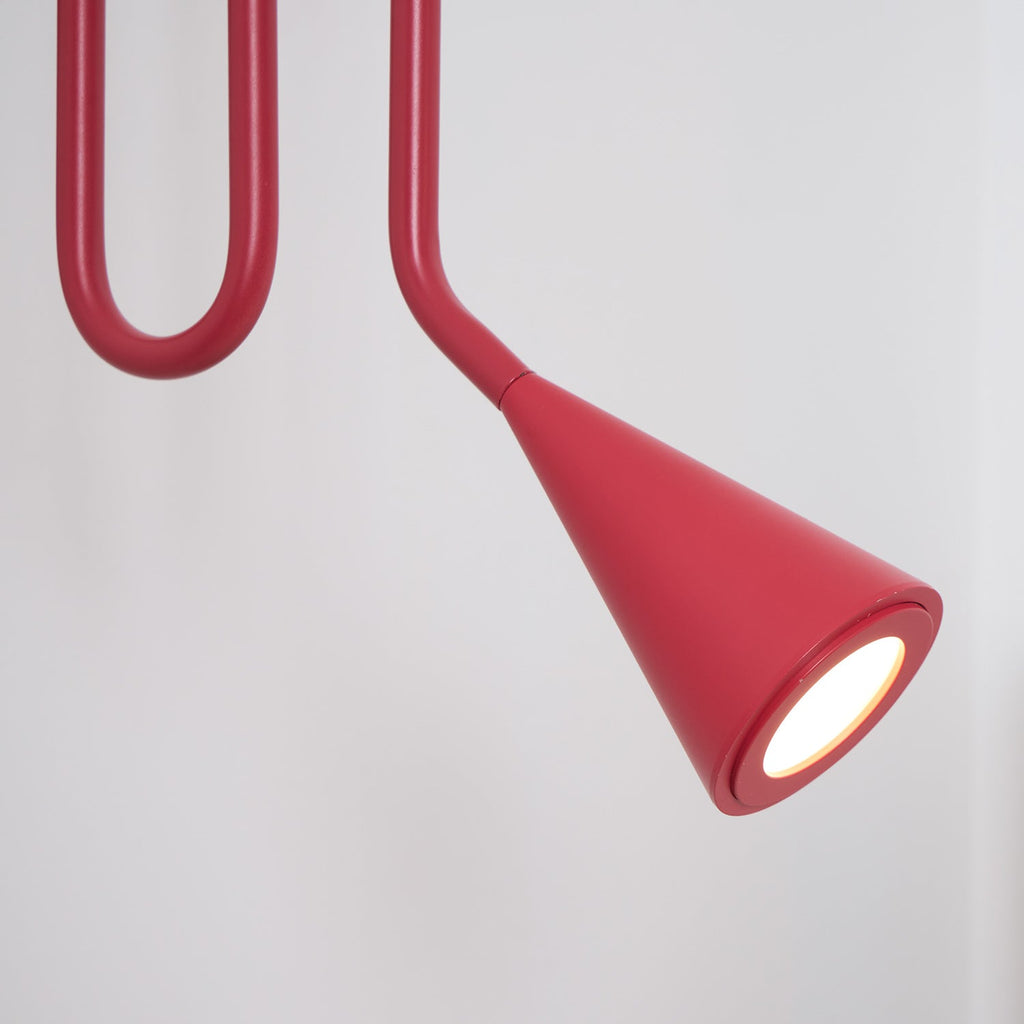 Curved Instrument-Inspired Metal Wall Lamp