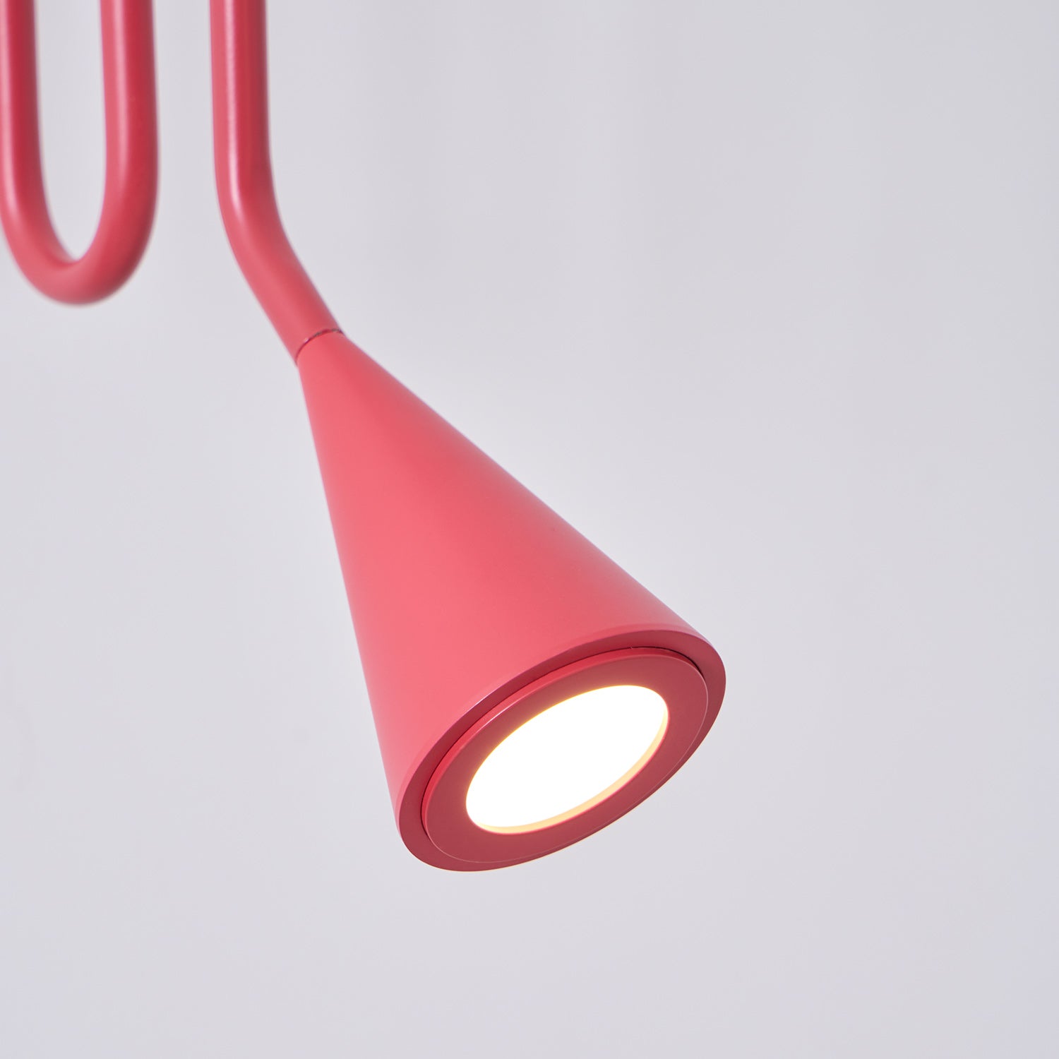 Curved Instrument-Inspired Metal Wall Lamp