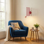 Curved Instrument-Inspired Metal Wall Lamp