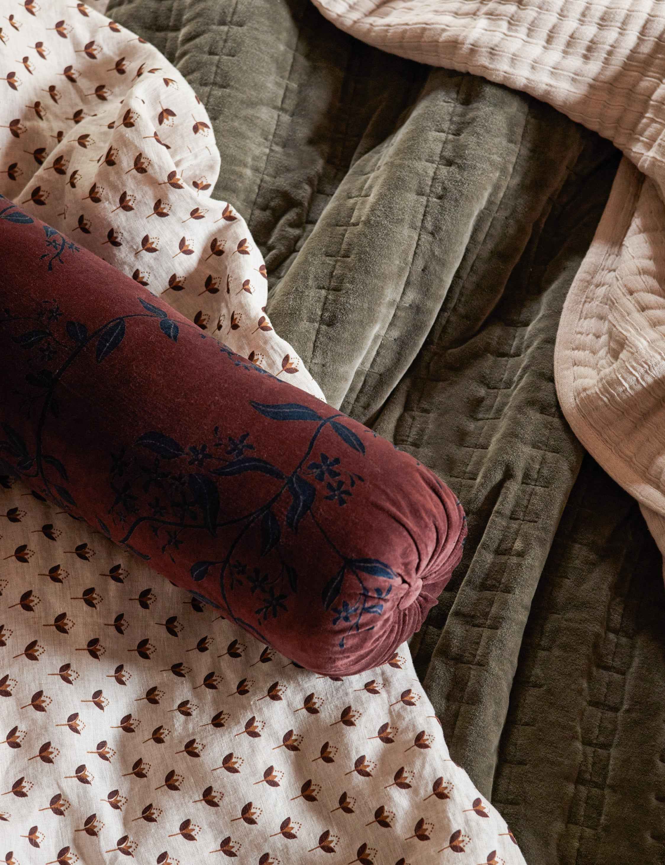 Carmine Velvet Bolster Pillow | Dark Floral Print on Rich Red Velvet