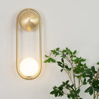 Brushed Brass Capsule Opal Orb Wall Sconce