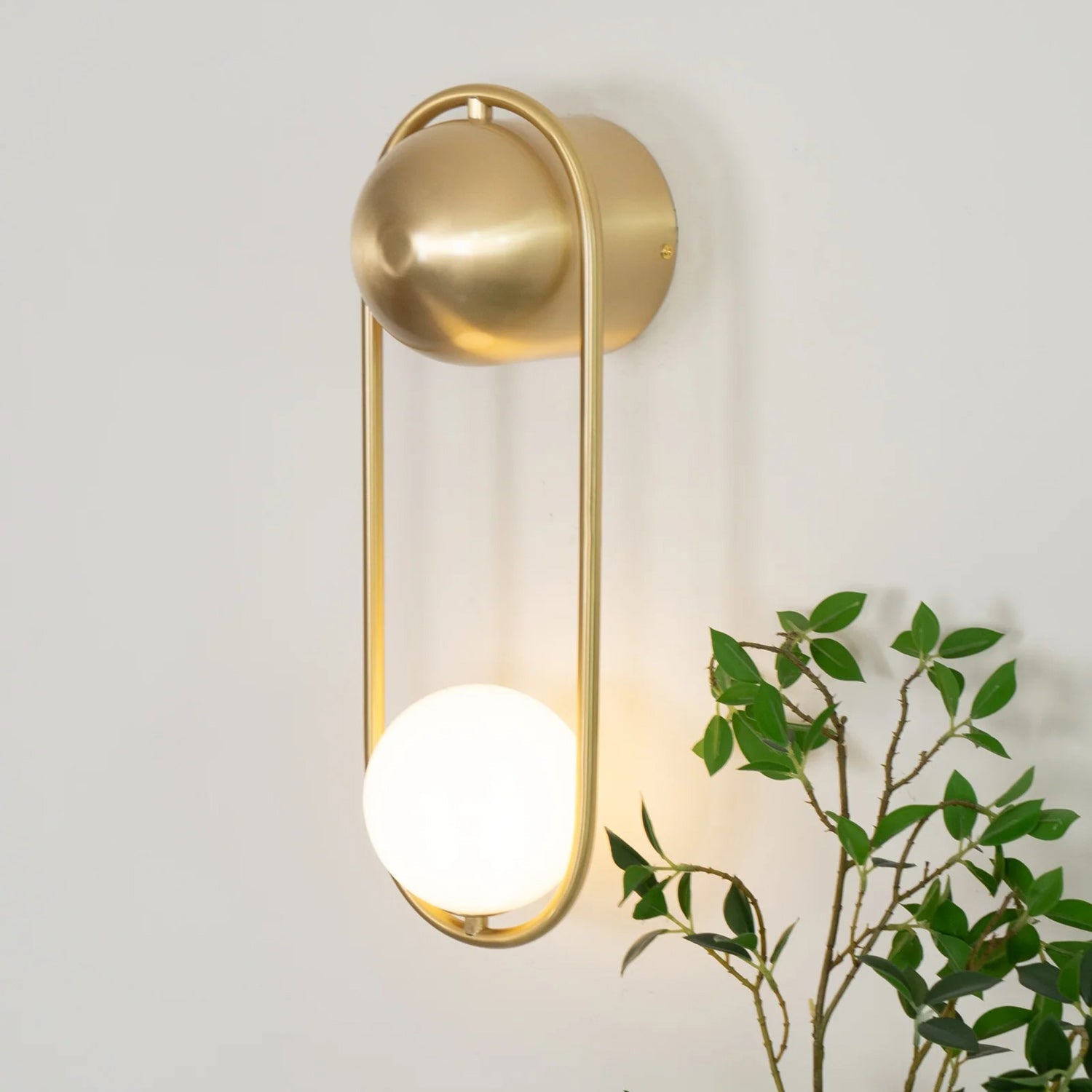Brushed Brass Capsule Opal Orb Wall Sconce