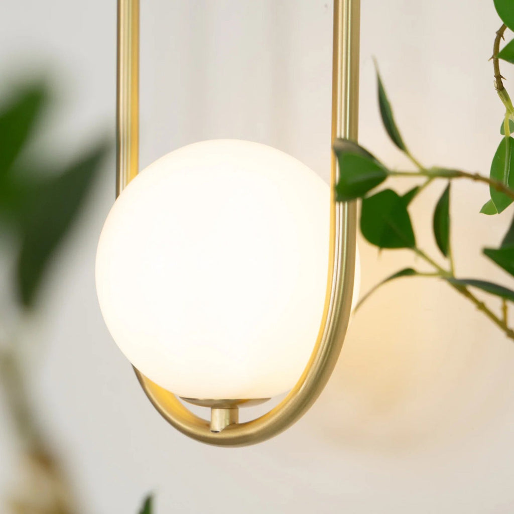 Brushed Brass Capsule Opal Orb Wall Sconce