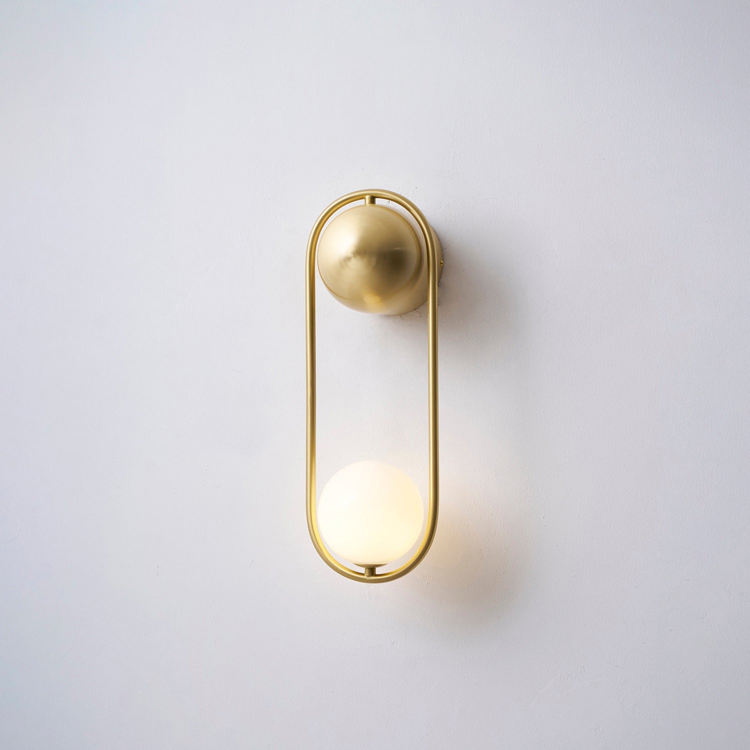 Brushed Brass Capsule Opal Orb Wall Sconce