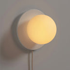 Glass Globe Plug-In Bedside Wall Sconce