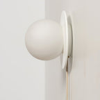 Glass Globe Plug-In Bedside Wall Sconce