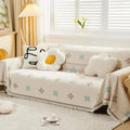 Meringue: Sofa cover in modern chenille design with geometric shapes & non-slip grip – for couch & lounge